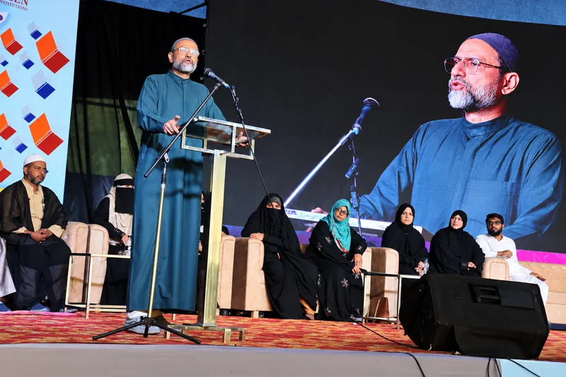 Speaker Addressing a Seated Panel